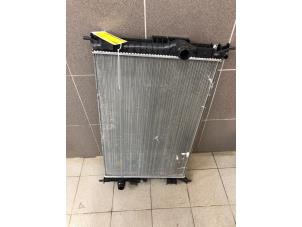 Gebruikte Radiateur Opel Astra L (F3/FB/FM/FP) 1.2 Turbo 110 12V Prijs € 59,00 Margeregeling aangeboden door Wessel Parts & Service B.V.