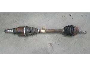 Gebruikte Aandrijfas rechts-voor Dacia Logan MCV (KS) 1.6 16V Prijs € 45,00 Margeregeling aangeboden door De Witte Boerderij AutoMotive