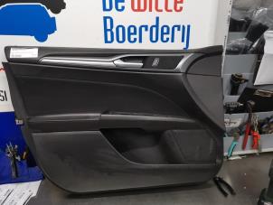 Gebruikte Deurbekleding 4Deurs links-voor Ford Mondeo V 1.5 EcoBoost 16V Prijs € 45,00 Margeregeling aangeboden door De Witte Boerderij AutoMotive