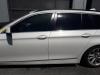 BMW 5 serie Touring (F11) 520d xDrive 16V B-stijl links