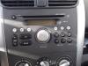 Radio CD Speler van een Suzuki Splash, 2008 / 2015 1.0 12V, MPV, Benzine, 996cc, 50kW (68pk), FWD, K10B, 2011-06 / 2015-12, EXB22S 2012