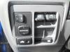 Raam schakelaar elektrisch van een Daihatsu Cuore (L251/271/276), 2003 1.0 12V DVVT, Hatchback, Benzine, 989cc, 43kW (58pk), FWD, EJVE, 2003-05 / 2008-01, L251 2004