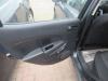 Mazda 2 (DE) 1.4 CDVi 16V Deurbekleding 4Deurs links-achter