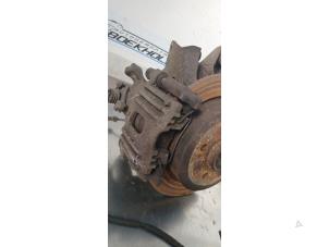 Gebruikte Remklauw (Tang) links-achter BMW Mini One/Cooper (R50) 1.6 16V One Prijs € 33,00 Margeregeling aangeboden door Boekholt autodemontage B.V