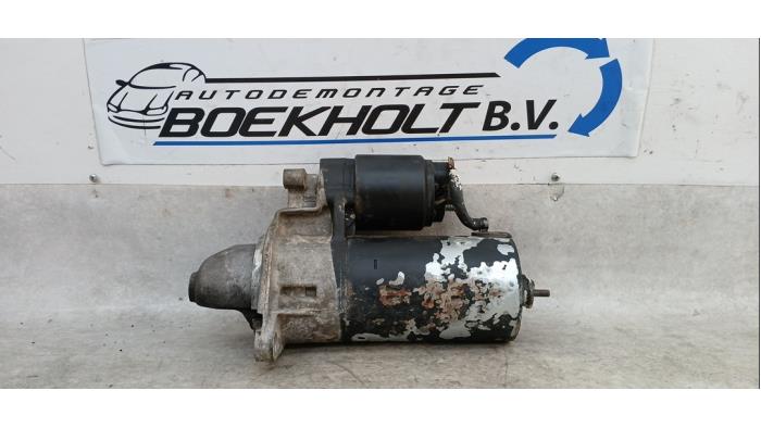 Startmotor van een Opel Calibra 2.5 V6 24V 1994