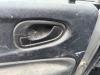 Mitsubishi Space Star (DG) 1.8 MPi 16V Deurgreep 4Deurs links-achter