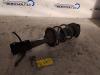 Toyota Yaris (P1) 1.0 16V VVT-i Mac Phersonpoot links-voor