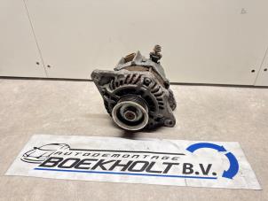 Gebruikte Dynamo Mitsubishi Colt (Z2/Z3) 1.3 16V Prijs € 35,00 Margeregeling aangeboden door Boekholt autodemontage B.V