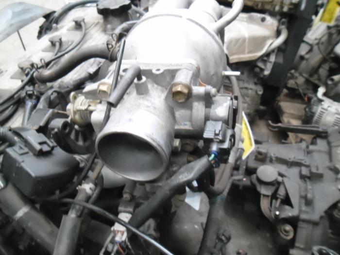 Gebruikte Gasklephuis Toyota Corolla (E11) 1.3 16V Prijs € 50,00 Margeregeling aangeboden door Boekholt autodemontage B.V