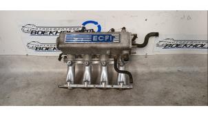 Gebruikte Inlaatspruitstuk Hyundai S-coupe 1.5i Base,LS 12V Prijs € 49,00 Margeregeling aangeboden door Boekholt autodemontage B.V