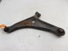 Mitsubishi Mirage Draagarm links-voor