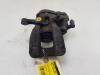 Remklauw (Tang) links-achter van een Opel Insignia Sports Tourer 1.5 Turbo 16V 165 2020