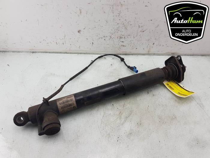 Schokdemper links-achter van een BMW Z4 Roadster (E89) sDrive 35i 3.0 24V 2011