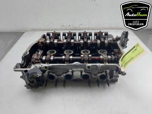 Gebruikte Cilinderkop Mini Mini (R56) 1.4 16V One Prijs € 850,00 Margeregeling aangeboden door AutoHam