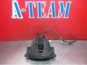 Gebruikte Remklauw (Tang) links-voor Ford Focus 3 Wagon 1.6 SCTi 16V Prijs € 29,99 Margeregeling aangeboden door A-Team Automotive