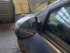 Buitenspiegel links van een Renault Twingo II (CN) 1.2 16V 2011