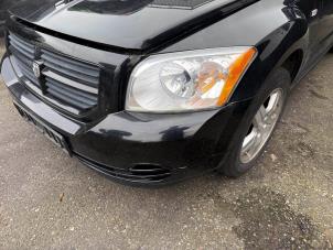 Gebruikte Koplamp links Dodge Caliber 2.0 16V Prijs op aanvraag aangeboden door A-team Automotive