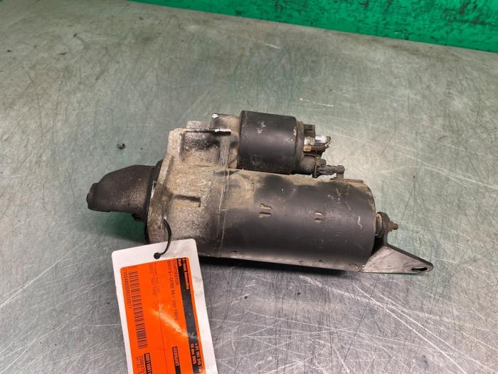 Startmotor van een BMW 5 serie (E34) 520i 24V 1991
