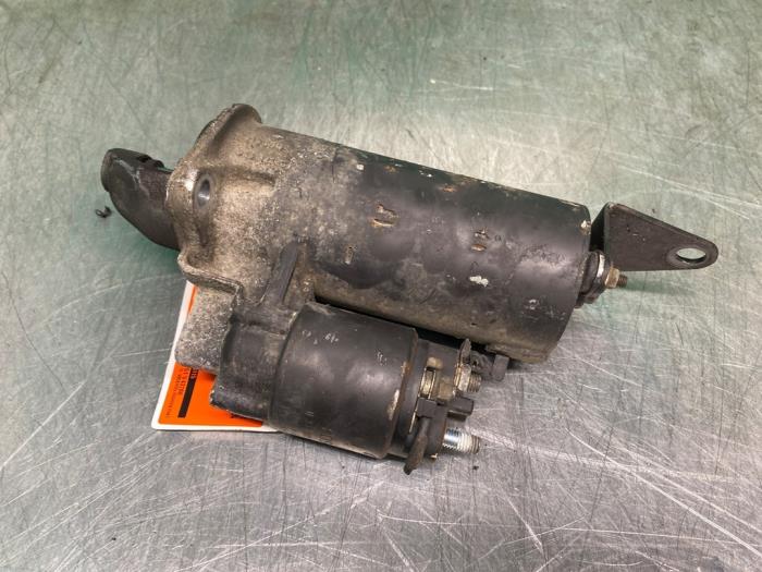 Startmotor van een BMW 5 serie (E34) 520i 24V 1991