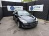 Fusee links-voor van een Renault Megane III Grandtour (KZ), 2008 / 2016 1.6 16V Bifuel, Combi/o, 4Dr, 1.598cc, 81kW (110pk), FWD, K4M866; K4MT8, 2008-11 / 2015-08, KZ03; KZ1Y; KZG3 2011