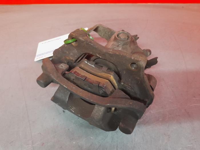 Rear brake calliper, left - 10447a64-58cd-4aaf-9f49-f87a2b1ccb7b.jpg