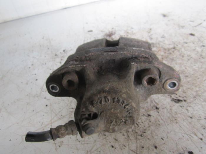 Front brake calliper, left - 5c7f6ed0-5a30-45d8-8957-4ee4b04020ff.jpg