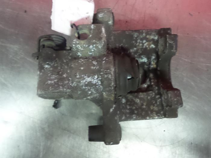 Rear brake calliper, left - 940d478f-a036-4d1a-8359-0c60f5bfe583.jpg