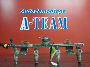 Gebruikte Injector brug Ford Mondeo III Wagon 1.8 16V Prijs € 14,99 Margeregeling aangeboden door A-Team Automotive