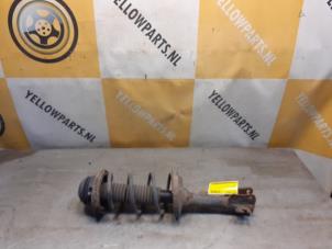 Gebruikte Schokbrekerpoot links-achter Suzuki Liana (ERC/ERD/RH4) 1.6 MPi 16V Prijs € 45,00 Margeregeling aangeboden door Yellow Parts