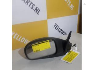 Gebruikte Buitenspiegel links Suzuki Baleno (GA/GB) 1.6 16V Prijs € 20,00 Margeregeling aangeboden door Yellow Parts
