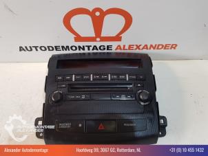 Gebruikte Radiobedienings paneel Mitsubishi Outlander (CW) 2.2 DI-D 16V Clear Tec 4x4 Prijs € 125,00 Margeregeling aangeboden door Alexander Autodemontage