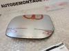 Spiegelglas links van een Toyota Yaris II (P9) 1.3 16V VVT-i 2007