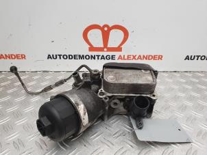 Gebruikte Oliefilterhuis Opel Corsa D 1.3 CDTi 16V ecoFLEX Prijs € 29,99 Margeregeling aangeboden door Alexander Autodemontage
