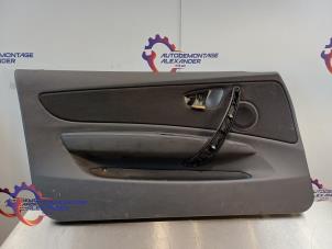Gebruikte Deurbekleding 2Deurs links BMW 1 serie (E82) 118d 16V Prijs € 32,50 Inclusief btw aangeboden door Alexander Autodemontage