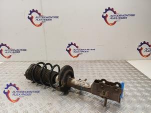 Gebruikte Schokdemper links-voor Ford Fiesta 6 (JA8) 1.6 TDCi 16V Prijs op aanvraag aangeboden door Alexander Autodemontage