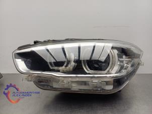 Gebruikte Koplamp links BMW 1 serie (F21) 118i 1.5 TwinPower 12V Prijs € 600,00 Inclusief btw aangeboden door Alexander Autodemontage