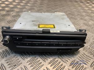 Gebruikte CD Wisselaar BMW 1 serie (E81) 120i 16V Prijs € 174,00 Margeregeling aangeboden door Autodemontagebedrijf Middelburg B.V