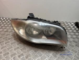 Gebruikte Koplamp rechts BMW 1 serie (E87/87N) 118i 16V Prijs € 49,00 Margeregeling aangeboden door Autodemontagebedrijf Middelburg B.V