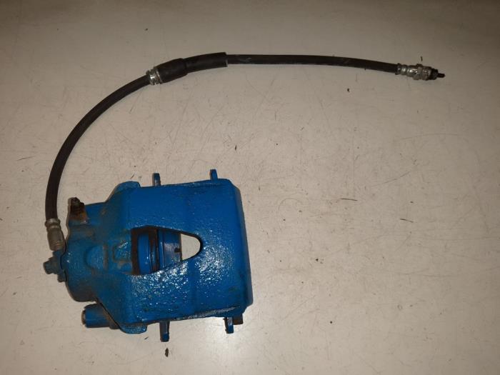 Volkswagen Caddy Remklauw (Tang) links-voor