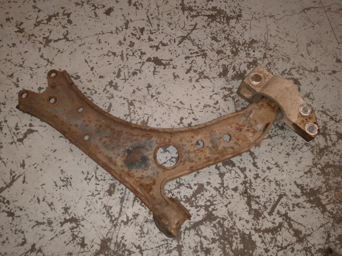 Volkswagen Caddy Draagarm links-voor
