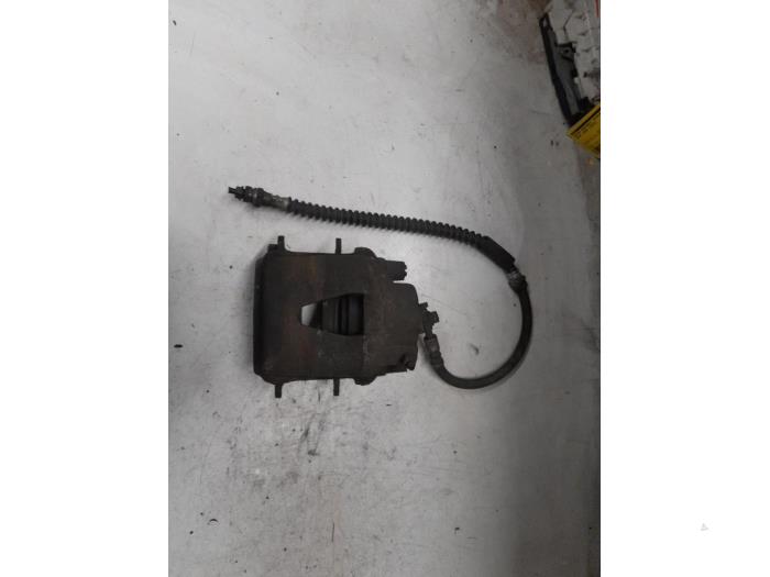 Volkswagen Caddy Remklauw (Tang) links-voor