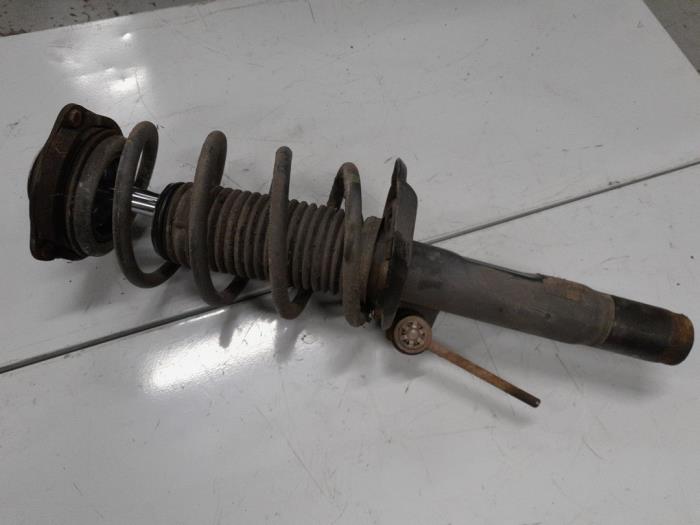 Volkswagen Caddy Schokdemperpoot links-voor