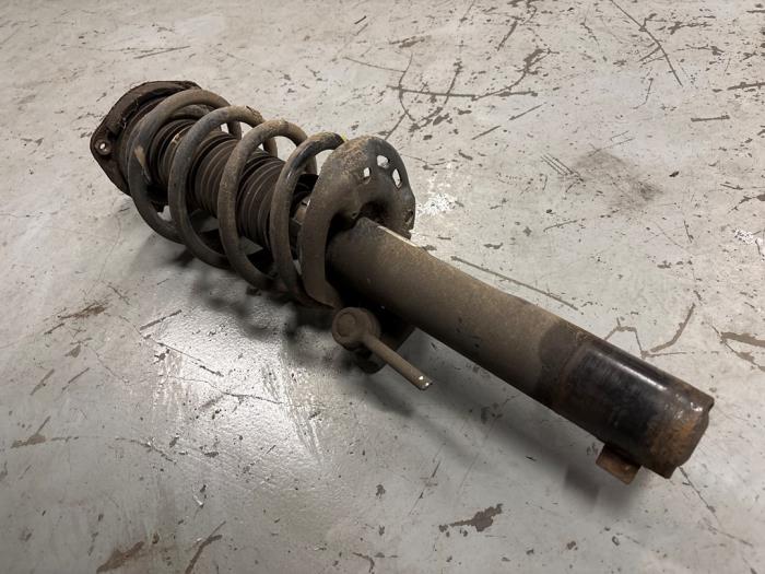 Volkswagen Caddy Schokdemperpoot links-voor