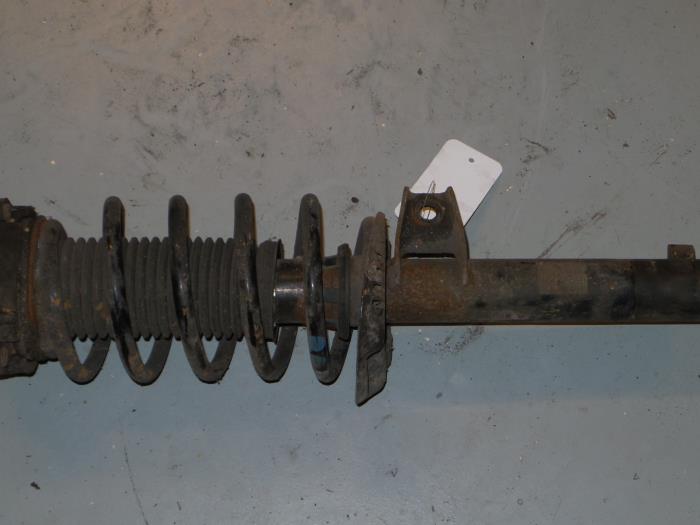 Volkswagen Caddy Schokdemperpoot links-voor