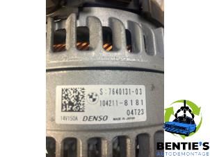 Dynamo van een BMW 2 serie Active Tourer (F45) 218d 2.0 TwinPower Turbo 16V 2015