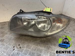 Gebruikte Koplamp links BMW 1 serie (E81) 118i 16V Prijs € 75,00 Margeregeling aangeboden door Bentie's autodemontage