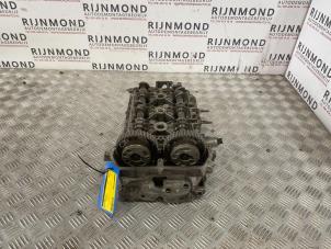 Gebruikte Cilinderkop Peugeot 208 I (CA/CC/CK/CL) Prijs € 225,00 Margeregeling aangeboden door Autodemontage Rijnmond BV