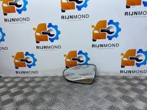 Gebruikte Spiegelglas links Kia Rio III (UB) 1.1 CRDi VGT 12V Prijs op aanvraag aangeboden door Autodemontage Rijnmond BV