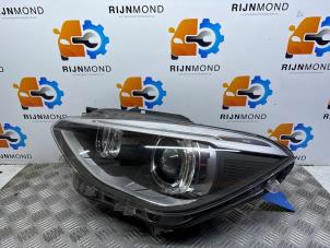 Gebruikte Koplamp links BMW 1 serie (F20) 114i 1.6 16V Prijs € 600,00 Margeregeling aangeboden door Autodemontage Rijnmond BV