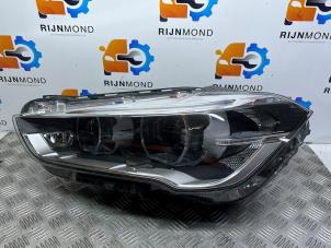 Gebruikte Koplamp links BMW X1 (F48) xDrive 20d 2.0 16V Prijs € 907,50 Inclusief btw aangeboden door Autodemontage Rijnmond BV